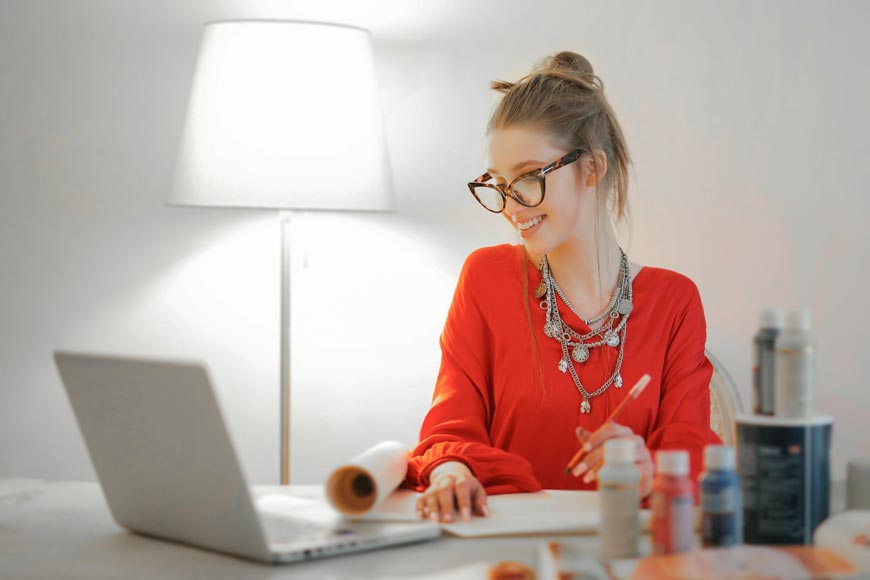 Photo by Andrea Piacquadio: https://www.pexels.com/photo/woman-in-red-long-sleeve-shirt-looking-at-her-laptop-3765132/